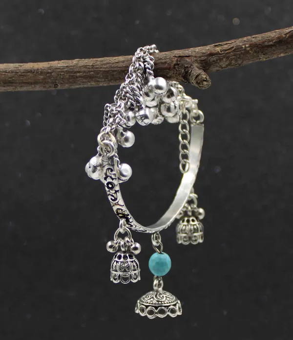 Oxidized_Floral_Engraved_Bracelet_with_Dome_Charms_and_Blue_Bead