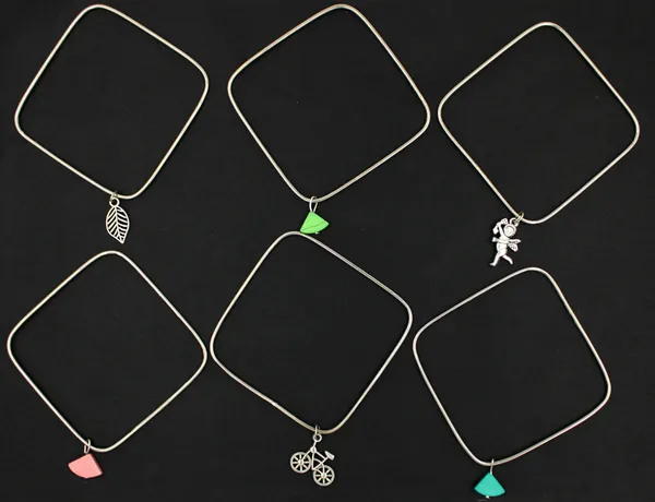 Square_Oxidised_Bangles_with_Mixed_Charms_Boho_Fusion_Style
