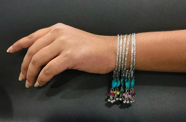 Oxidised_Silver_Bangles_-_Set_with_Turquoise_Heart_Beads___Multi-Ghungroo_Charms_-_Set_of_6