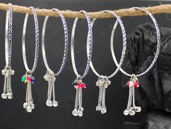 Jingle_Glam_Oxidized_Silver_Bangles_with_Dangling_Beads___Charms