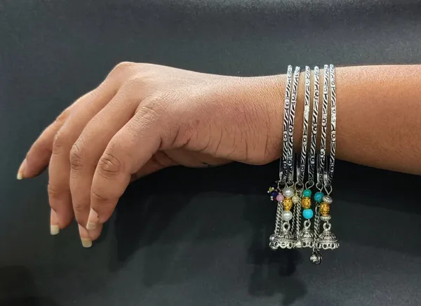 Ethnic_Melody_Oxidized_Silver_Bangles_with_Jhumki___Beaded_Danglers