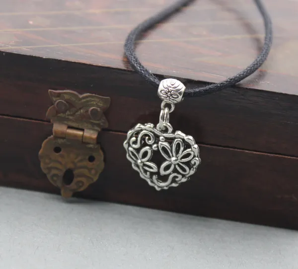 Black_Thread_Charm_Necklace_Set_for_Girls___Women___Heart,_Dolphin,_Butterfly___Ganesha_Pendants_(Set_of_4)
