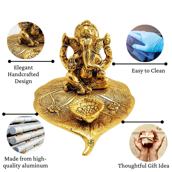 Ganesh_Idol_on_Leaf_with_Deepak_Lord_Ganesha_Metal_Handcrafted_Idol_with_Diya_Home_Decorative,_Puja,_Corporate_Spiritual_Gift_Gold_Finish