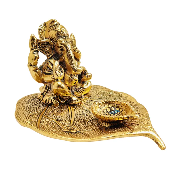 Ganesh_Idol_on_Leaf_with_Deepak_Lord_Ganesha_Metal_Handcrafted_Idol_with_Diya_Home_Decorative,_Puja,_Corporate_Spiritual_Gift_Gold_Finish