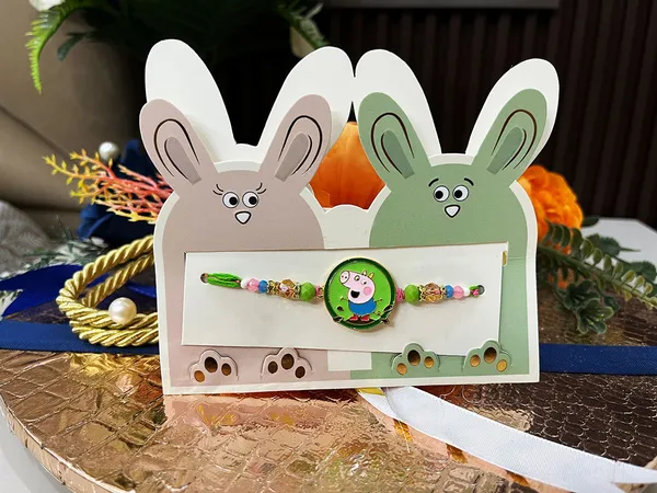 2_Pc_kids_metallic_Rakhi_with_all_Tika_essentials_for_Bhatija_bhateeji_(random_design-2_pc_only)