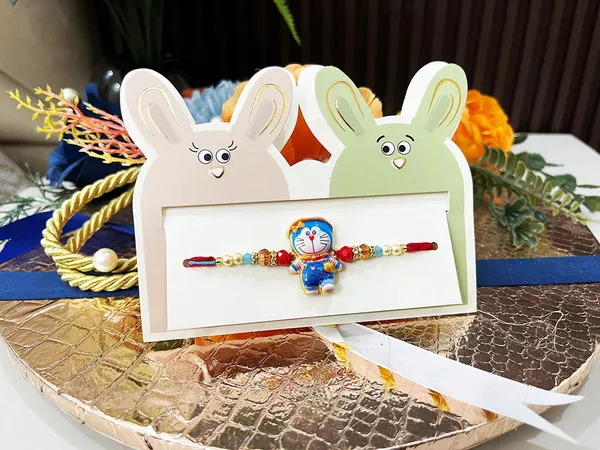 2_Pc_kids_metallic_Rakhi_with_all_Tika_essentials_for_Bhatija_bhateeji_(random_design-2_pc_only)