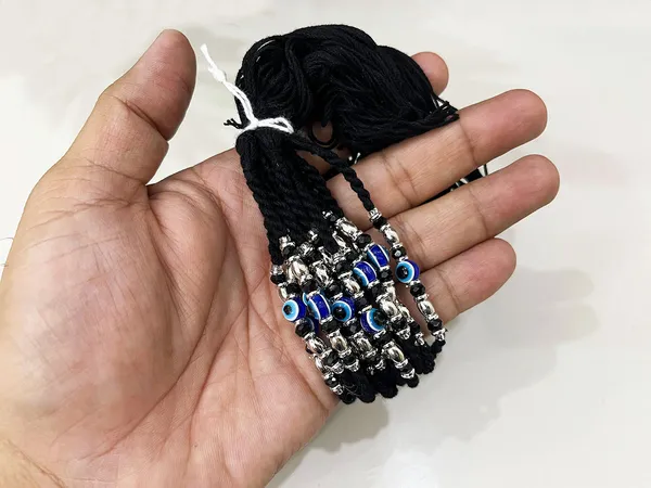 4_Pcs_Black_Durable_Raksha_Sutra_Bracelet_with_Evil_Eye_&_Silver_Bead_|_Nazarbattu_Cotton_Dhaga_Rakhi_for_Men,_Women_&_Kids_|_Family_Pack_for_Raksha_Bandhan_&_day_to_day_use