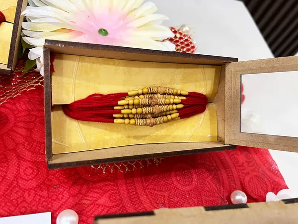 Chandan_sugandhit_Rudraksh_Rakhi_Set_of_12_Designer_Rakhi_Combo_Pack,_Rakhi_For_bhai_Bhabhi_Kids_(Random_Designs_any_one_pack_of_12_pc)_with_Tika_pack