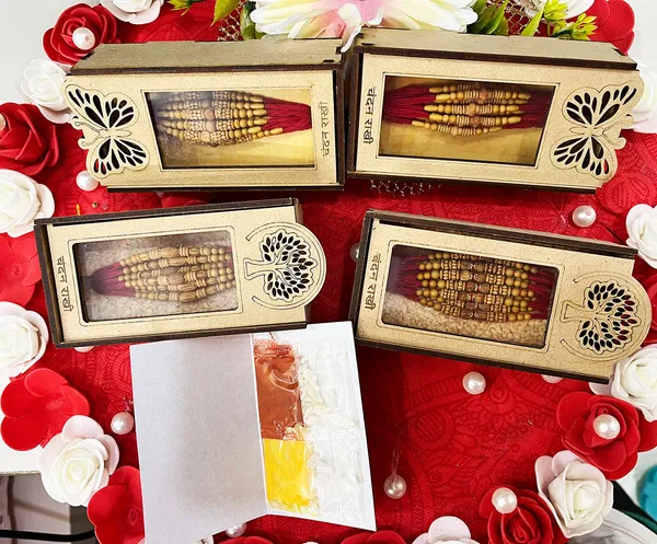 Chandan_sugandhit_Rudraksh_Rakhi_Set_of_12_Designer_Rakhi_Combo_Pack,_Rakhi_For_bhai_Bhabhi_Kids_(Random_Designs_any_one_pack_of_12_pc)_with_Tika_pack