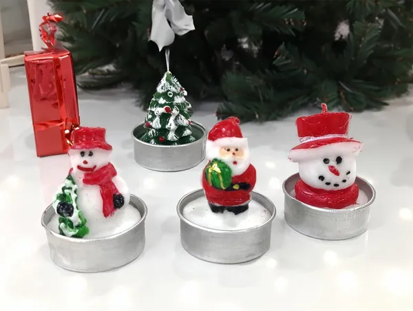 Multicolor_4_Piece_Miniature_Christmas_Tea_Light_Candle_Set_Handmade_Figures_1_Santa_Claus,_2_Snowman,_1_Christmas_Tree_Candles,_Christmas_Home_Decorations