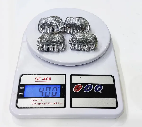 Silver_Ranga_Remedy/Ranga_Sikka_4_Piece_Lead_Elephant_Hathi_Figurine_For_Rahu_Dosh_Shanti_-_For_Floating_In_Water-_Jal_Mein_Pravahit_Karne_Ke_Liye_4_Piece
