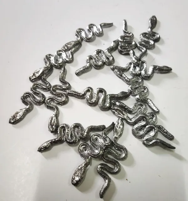 Silver_Ranga_Remedy/Ranga_Sikka_Snake/Nag_Figures_For_Kaal_Sarp_Dosh_Shanti_-_For_Floating_In_Water_(13-15_Piece)