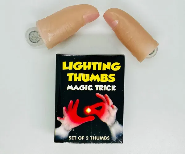 Red_Thumb_Light_Magic_Trick_–_Glowing_Finger_Illusion_Prop_for_Magicians_(Pack_of_2)