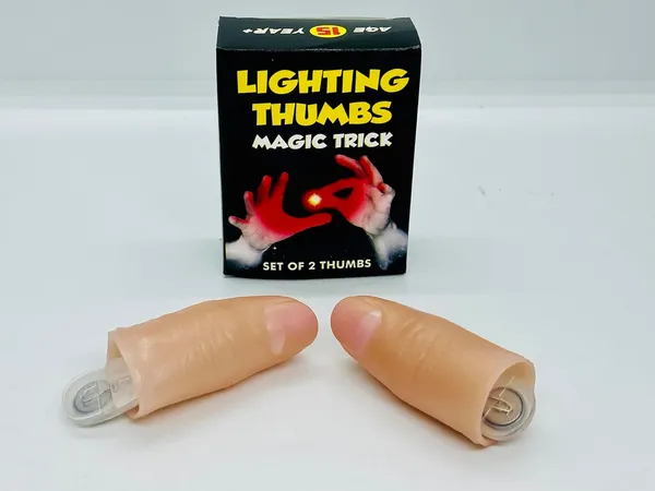 Red_Thumb_Light_Magic_Trick_–_Glowing_Finger_Illusion_Prop_for_Magicians_(Pack_of_2)