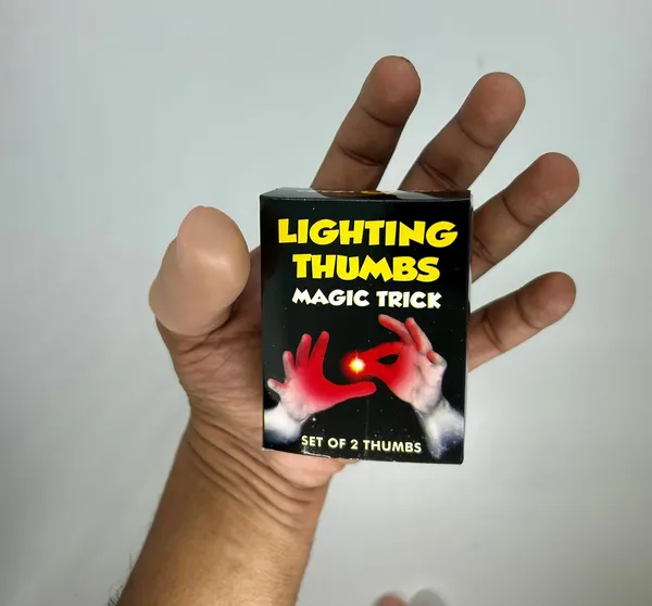 Red_Thumb_Light_Magic_Trick_–_Glowing_Finger_Illusion_Prop_for_Magicians_(Pack_of_2)