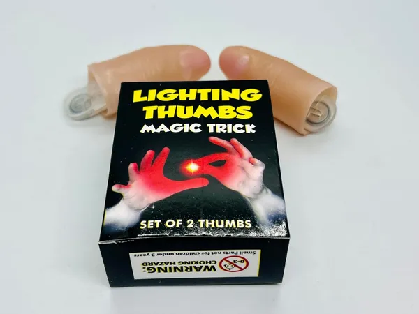 Red_Thumb_Light_Magic_Trick_–_Glowing_Finger_Illusion_Prop_for_Magicians_(Pack_of_2)