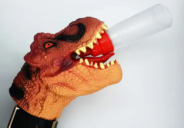 DINOSAUR_PUPPET_WITH_MAGIC_MILK_BOTTLE_TRICK_/_JURASSIC_MILKY_VENTRILOQUIST_DINOSAUR_PUPPET