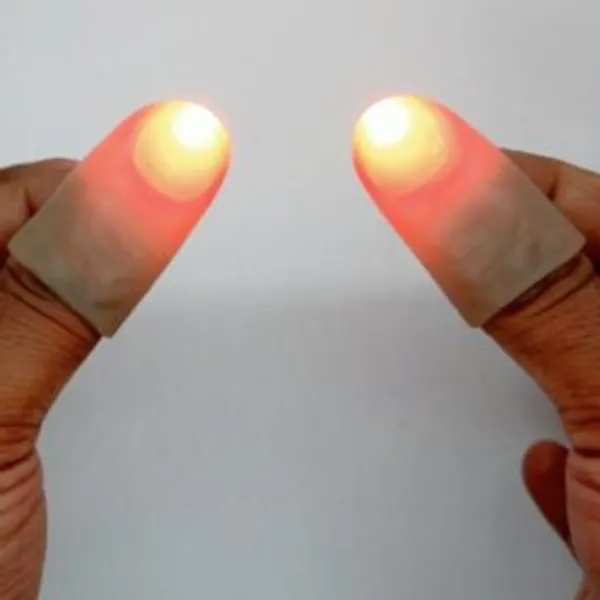 LIGHTING_THUMB_TIP_MAGIC_DARK_SKIN_TONE_(RED_2X_BRIGHT_LIGHT)_/_DELIGHT_THUMB_MAGIC_TRICK