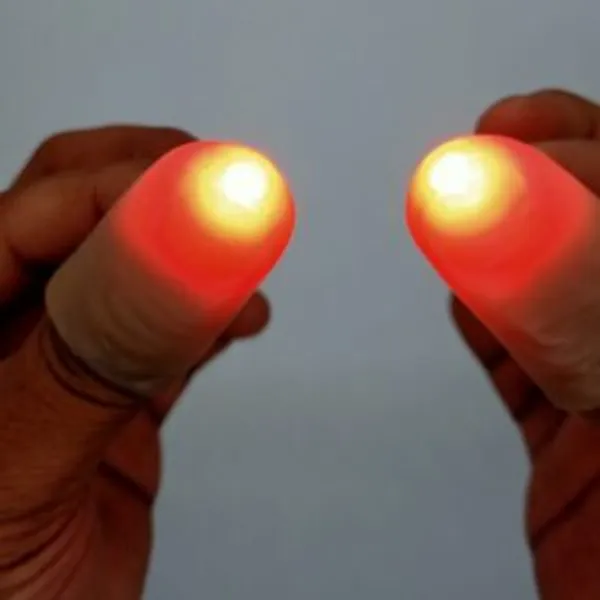 LIGHTING_THUMB_TIP_MAGIC_DARK_SKIN_TONE_(RED_2X_BRIGHT_LIGHT)_/_DELIGHT_THUMB_MAGIC_TRICK