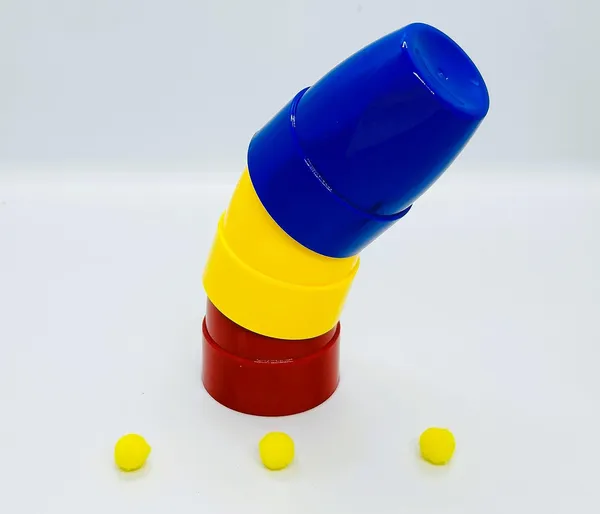 Three_Cups_and_Balls_Magic_Trick_(Plastic)