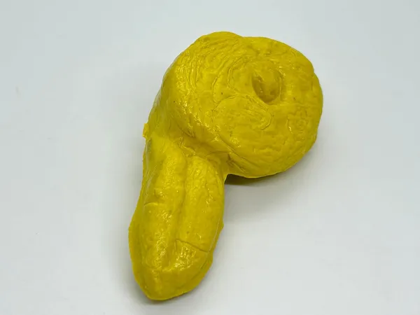 Fake_Poop_Gag_Toy_–_Realistic_Yellow_Plastic_Turd_Prank_for_Kids_and_Teens,_Funny_Desk_Showpiece_&_Paperweight