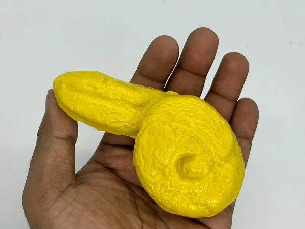 Fake_Poop_Gag_Toy_–_Realistic_Yellow_Plastic_Turd_Prank_for_Kids_and_Teens,_Funny_Desk_Showpiece_&_Paperweight