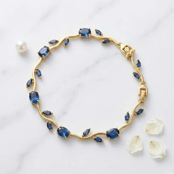 Elegant_Blue_Crystal_Floral_Vine_Bracelet_for_Women_&_Girls_–_Gold-Tone_Leaf_Design_Stone_Studded_Fashion_Bracelet