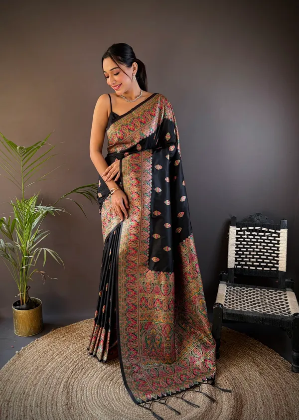 Artisanal_Black_Patola_Weave_Silk_Saree_With_A_Brilliant_Array_Of_Stylized_Animal_And_Floral_Imagery