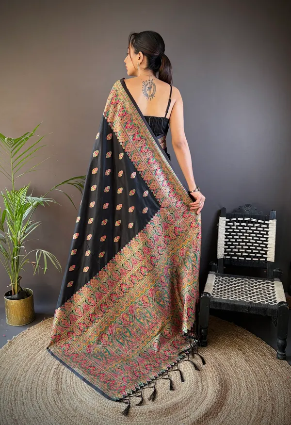 Artisanal_Black_Patola_Weave_Silk_Saree_With_A_Brilliant_Array_Of_Stylized_Animal_And_Floral_Imagery