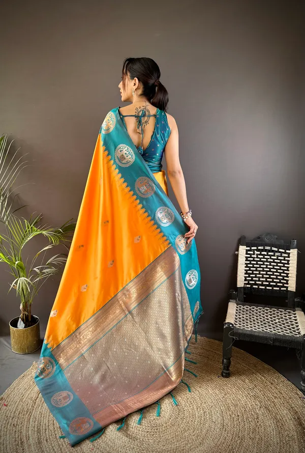 Radiant_Orange_&_Teal_Blue_Silk_Saree_With_Intricate_Temple_Border_And_Traditional