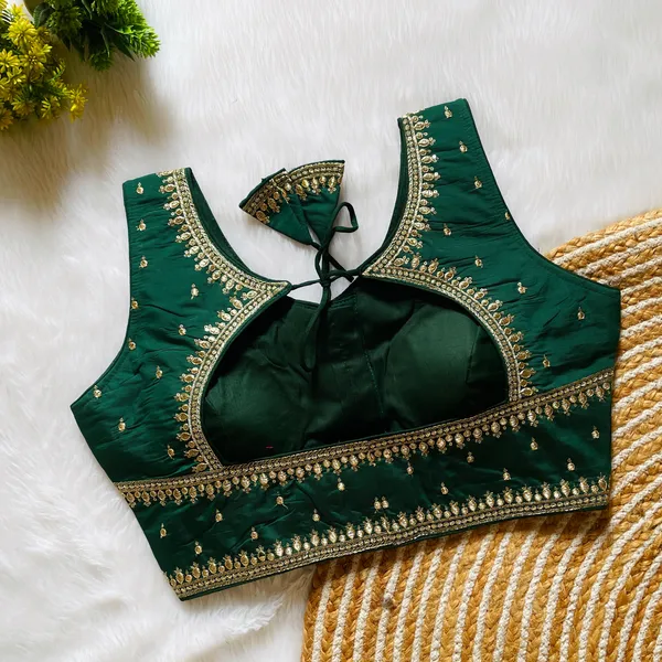 Stitched_Dark_Green_Silk_Blouse_with_Intricate_Zari_and_Sequin_Embroidery_Work