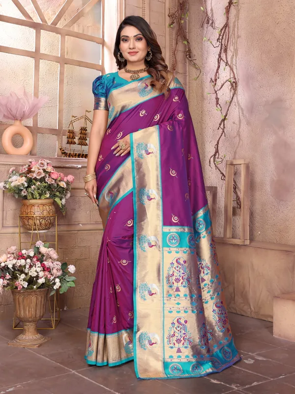 Plum_Purple_&_Bottle_Green_Elegant_Silk_Saree_With_Golden_Accents_And_Traditional_Motifs
