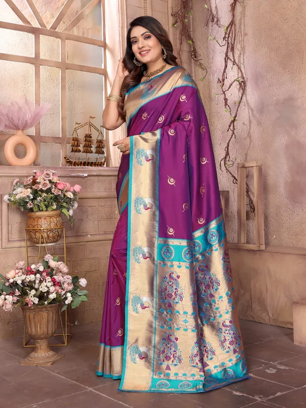 Plum_Purple_&_Bottle_Green_Elegant_Silk_Saree_With_Golden_Accents_And_Traditional_Motifs