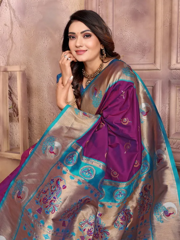 Plum_Purple_&_Bottle_Green_Elegant_Silk_Saree_With_Golden_Accents_And_Traditional_Motifs