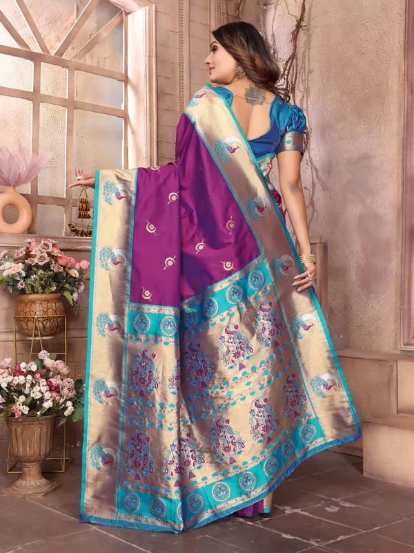 Plum_Purple_&_Bottle_Green_Elegant_Silk_Saree_With_Golden_Accents_And_Traditional_Motifs