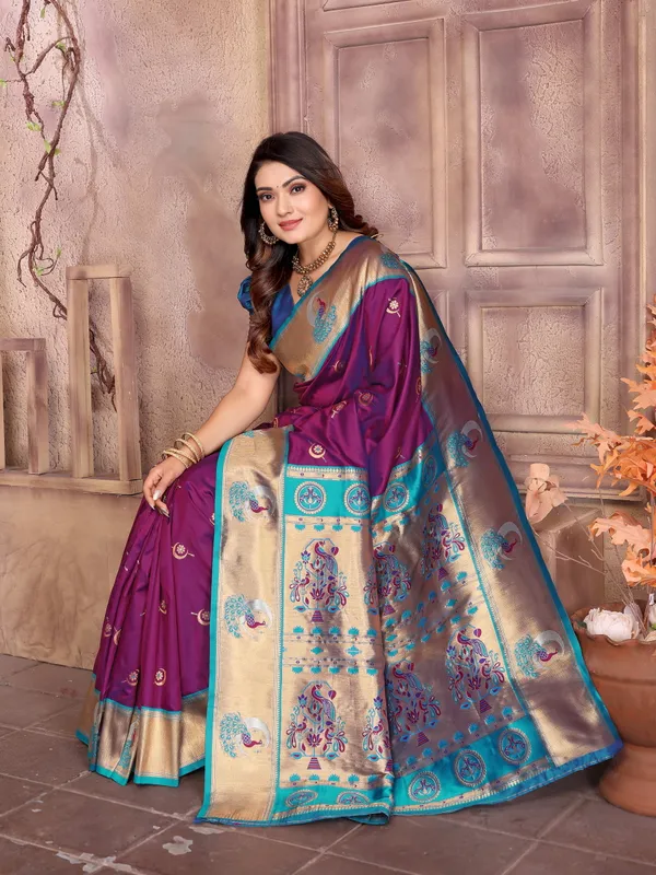 Plum_Purple_&_Bottle_Green_Elegant_Silk_Saree_With_Golden_Accents_And_Traditional_Motifs