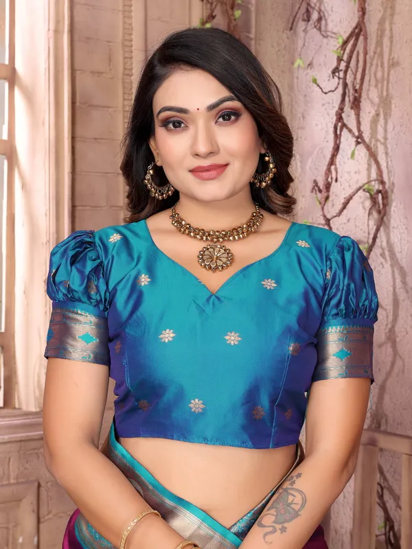 Plum_Purple_&_Bottle_Green_Elegant_Silk_Saree_With_Golden_Accents_And_Traditional_Motifs
