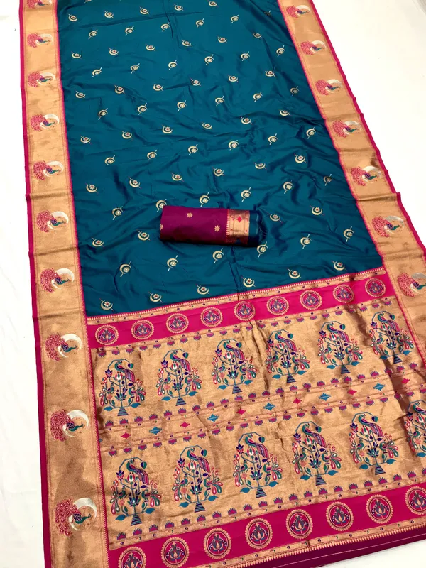 Plum_Purple_&_Bottle_Green_Elegant_Silk_Saree_With_Golden_Accents_And_Traditional_Motifs
