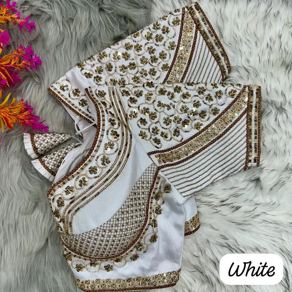 Elegant_White_Embroidered_Designer_Blouse_with_Golden_Zari_and_Sequin_Work