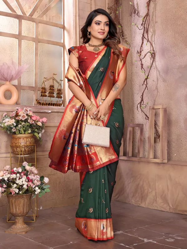 Forest_Green_&_Red_Silk_Saree_With_Resplendent_Border_And_Exquisite_Gold_Zari_Peacock