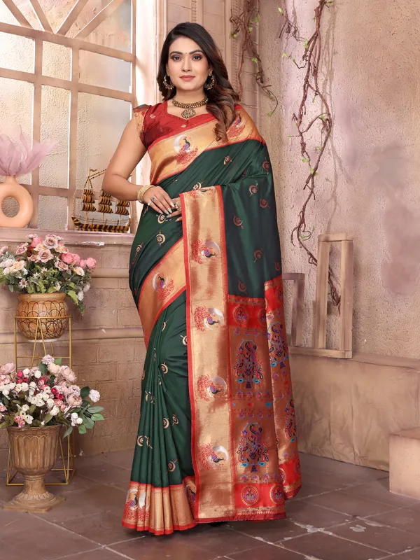 Forest_Green_&_Red_Silk_Saree_With_Resplendent_Border_And_Exquisite_Gold_Zari_Peacock