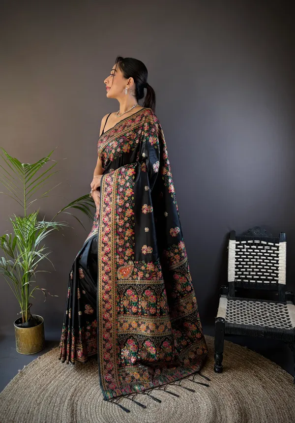 Jet_Black_Luxurious_Patola_Handloom_Saree_Featuring_A_Kaleidoscope_Of_Traditional_Animal