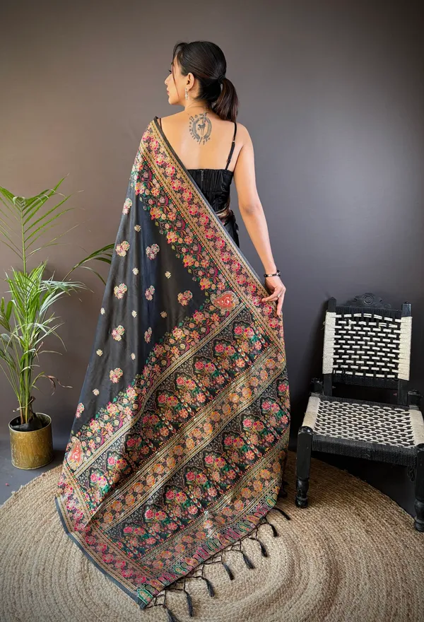 Jet_Black_Luxurious_Patola_Handloom_Saree_Featuring_A_Kaleidoscope_Of_Traditional_Animal