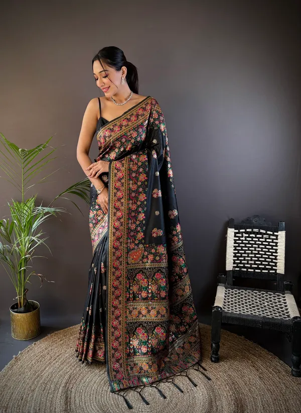 Jet_Black_Luxurious_Patola_Handloom_Saree_Featuring_A_Kaleidoscope_Of_Traditional_Animal