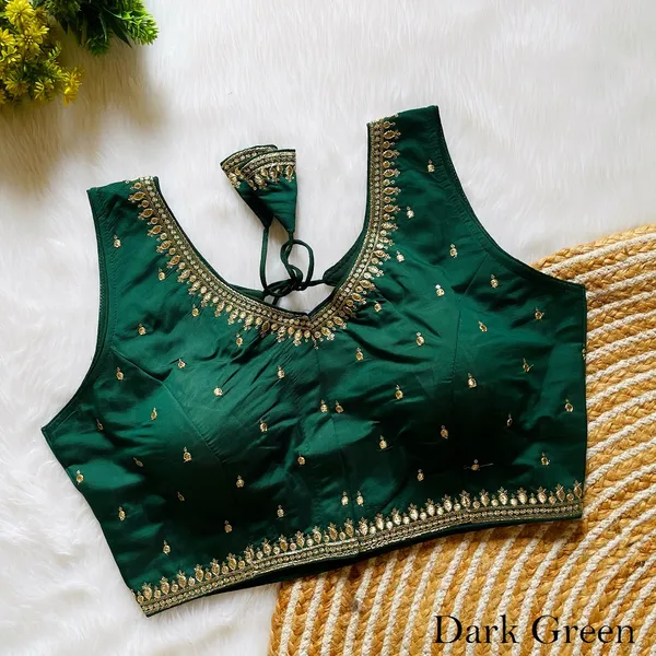 Stitched_Dark_Green_Silk_Blouse_with_Intricate_Zari_and_Sequin_Embroidery_Work