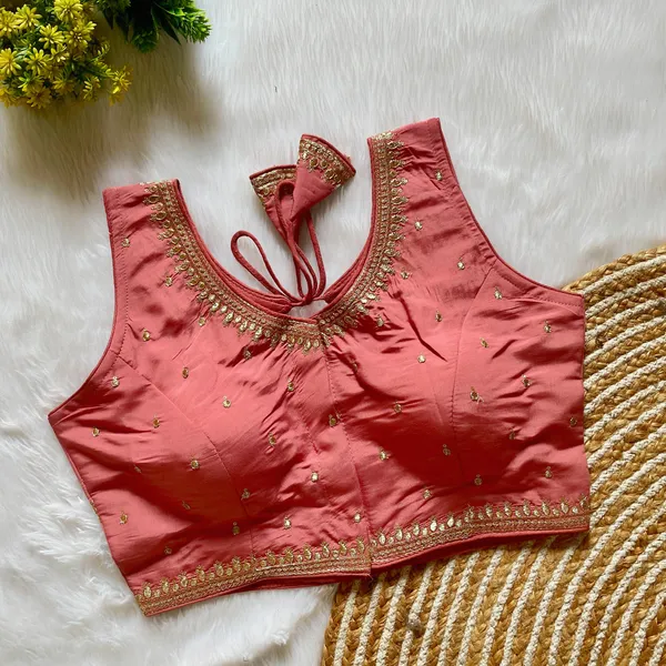 Peach_Silk_Blouse_Stitched_with_Intricate_Zari_and_Sequin_Embroidery_Work