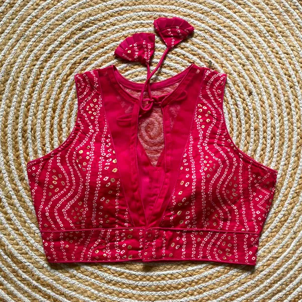 Pink_Rayon_Cotton_Bandhani_Print_Sleeveless_Blouse_with_Keyhole_Neck_and_Tassel_Tie-Up