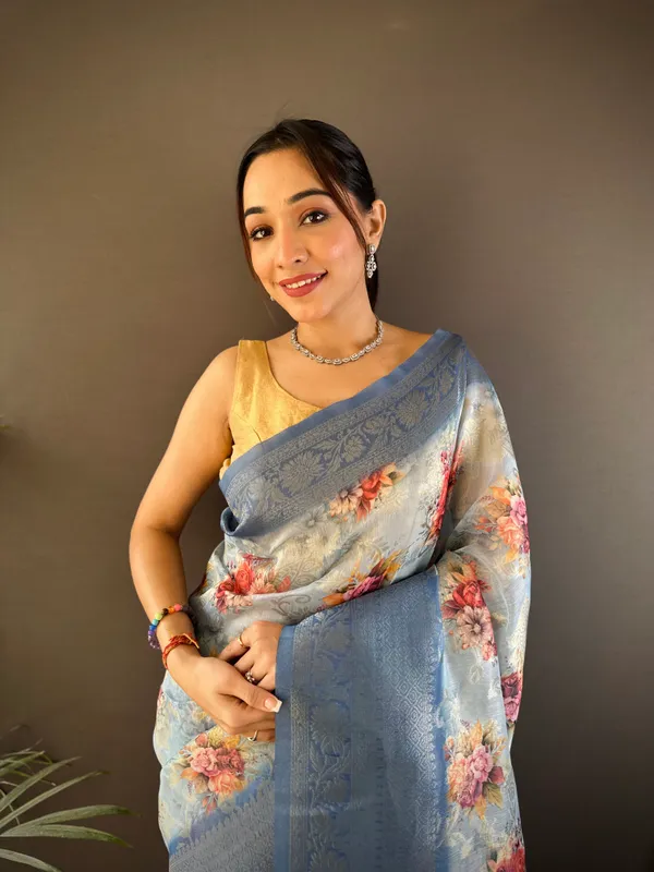 Powder_Blue_Floral_Printed_Saree_With_Zari_Border