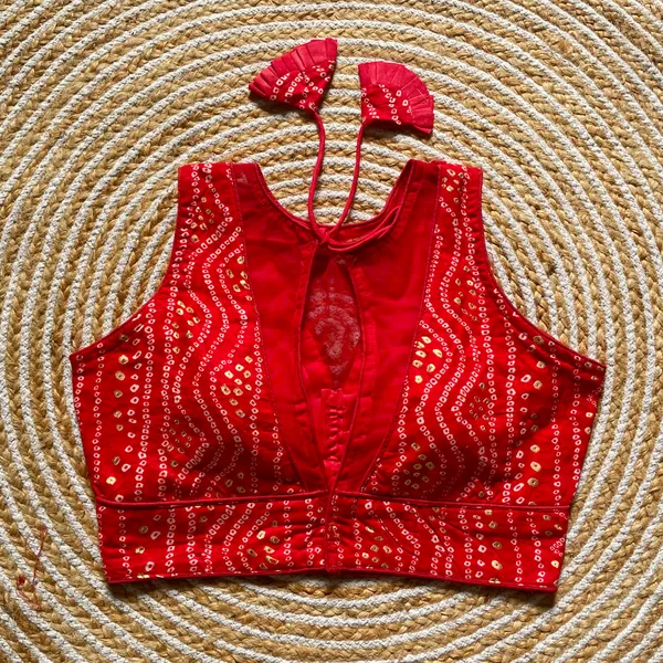 Red_Rayon_Cotton_Bandhani_Print_Sleeveless_Blouse_with_Keyhole_Neck_and_Tassel_Tie-Up