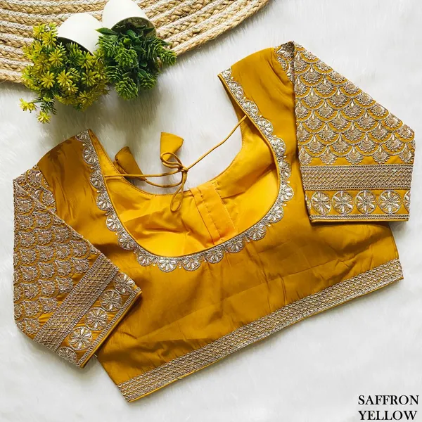 Stitched_Saffron_Yellow_Roman_Silk_Blouse_with_Embroidery_and_Lace_Work